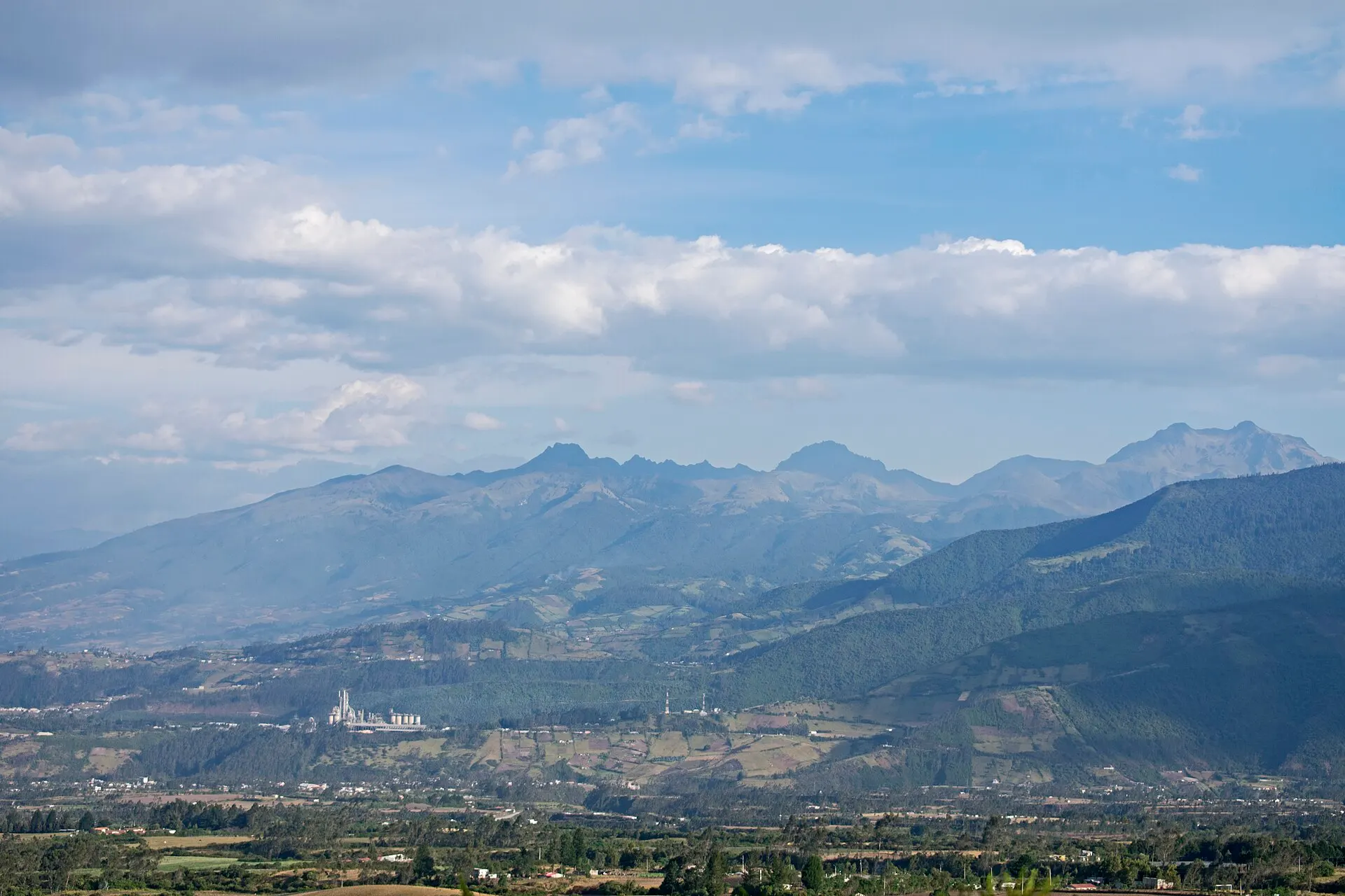 Andean ridgeline and cultivated valley in Imbabura seen from the Cuicocha park entrance